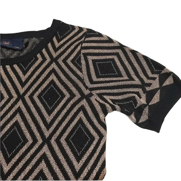 Just Taylor Black Gold Short Sleeve Sweater Dress
Size Large - Picture 8 of 9
